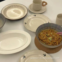 Elegant Ceramic Plates with Delicate Swallow Motifs